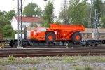 Mining dump truck on Russian depressed-center flat car